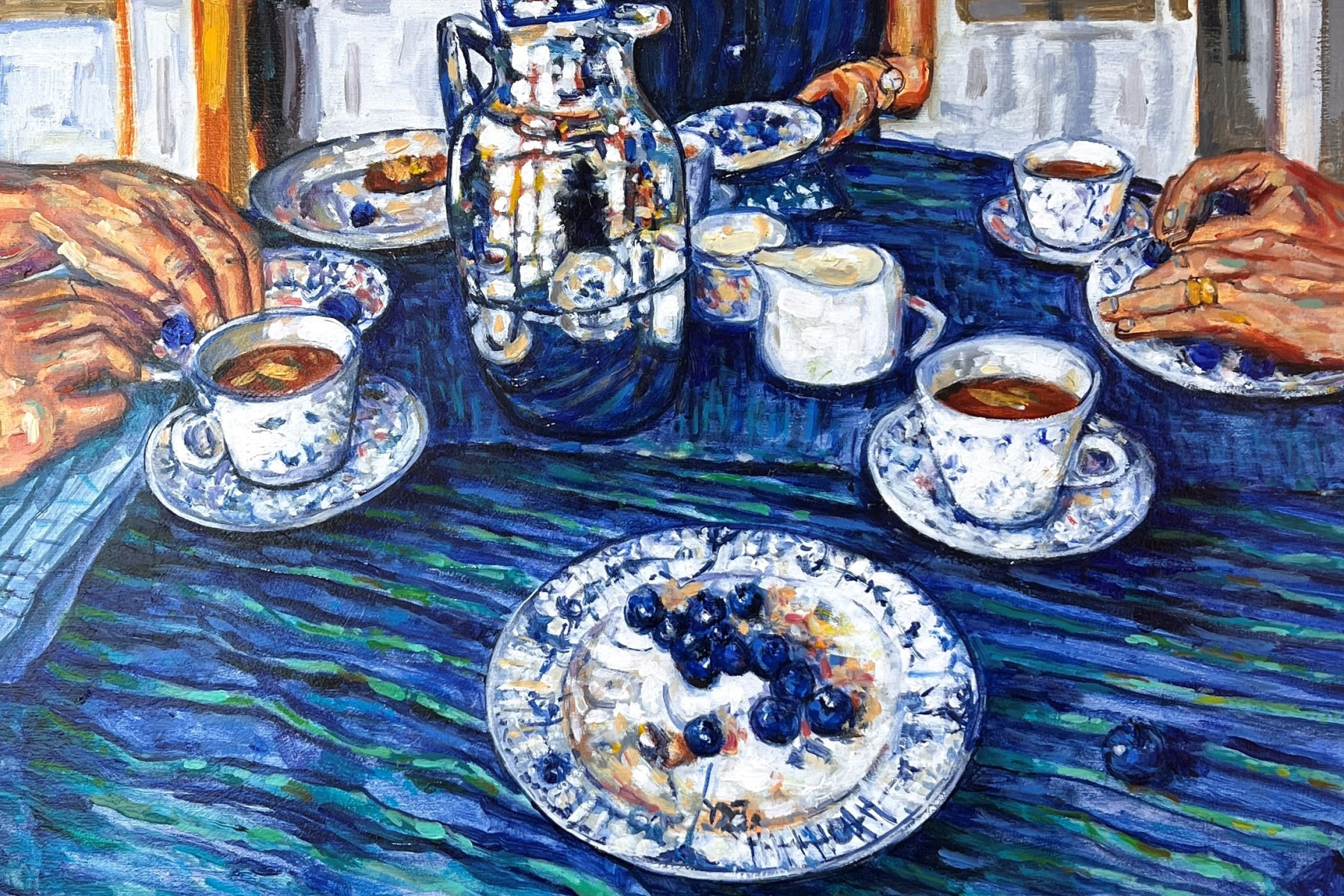 Blueberries and Tea is a dining table scene with a silver tea pot white and blue plates with blueberries and three sets of hands enjoying the food.